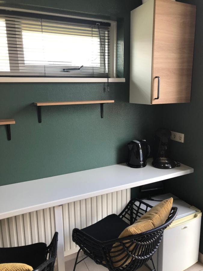 Nieboer Acomodação com café da manhã Vrouwenpolder Exterior foto
