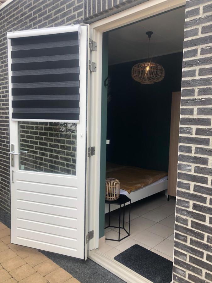 Nieboer Acomodação com café da manhã Vrouwenpolder Exterior foto