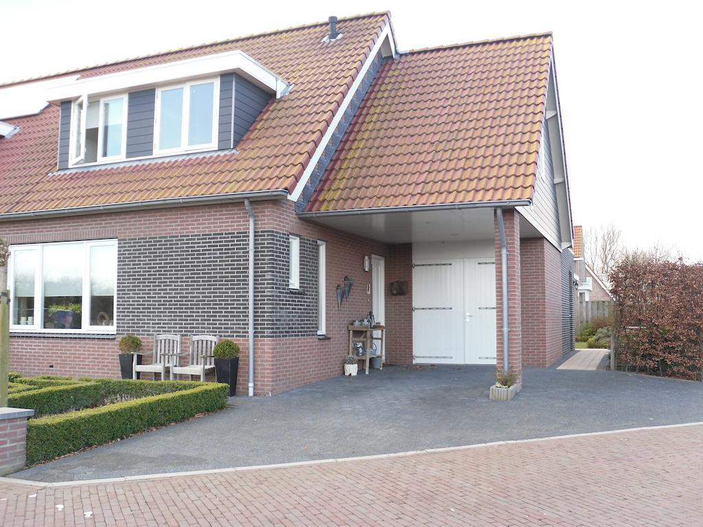 Nieboer Acomodação com café da manhã Vrouwenpolder Exterior foto